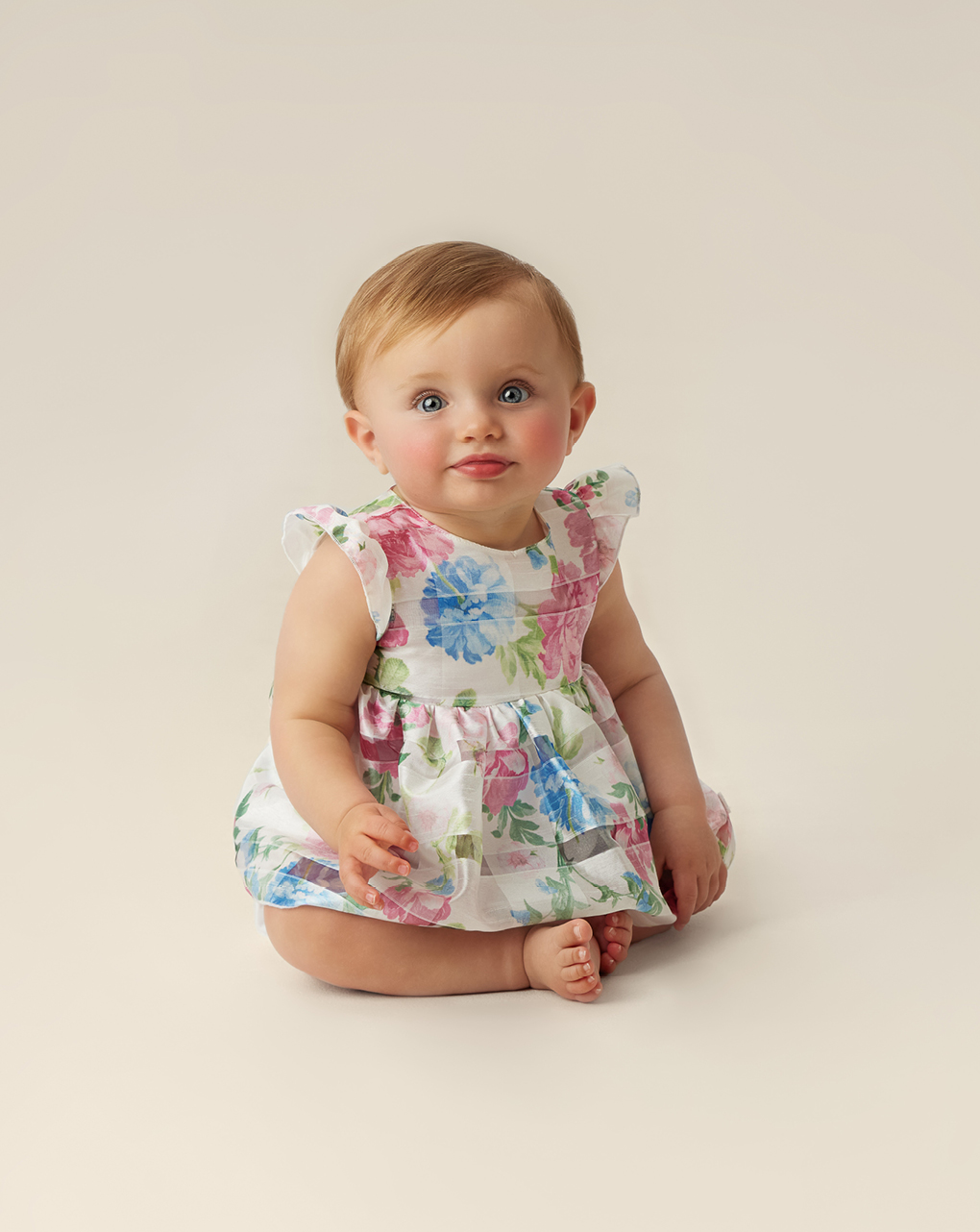 Pagliaccetto per neonata effetto abito fantasia floreale