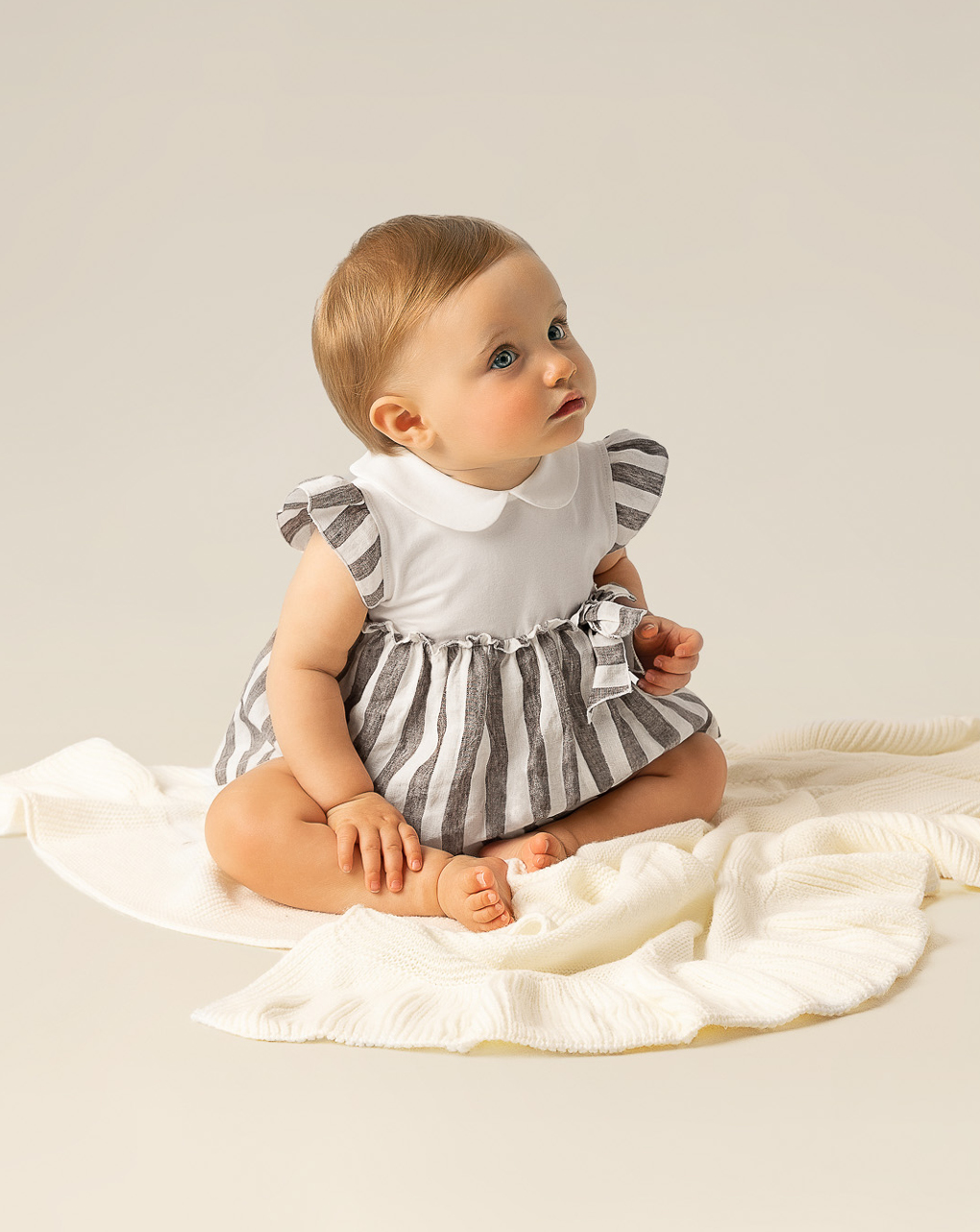 Pagliaccetto per neonata effetto abito a righe