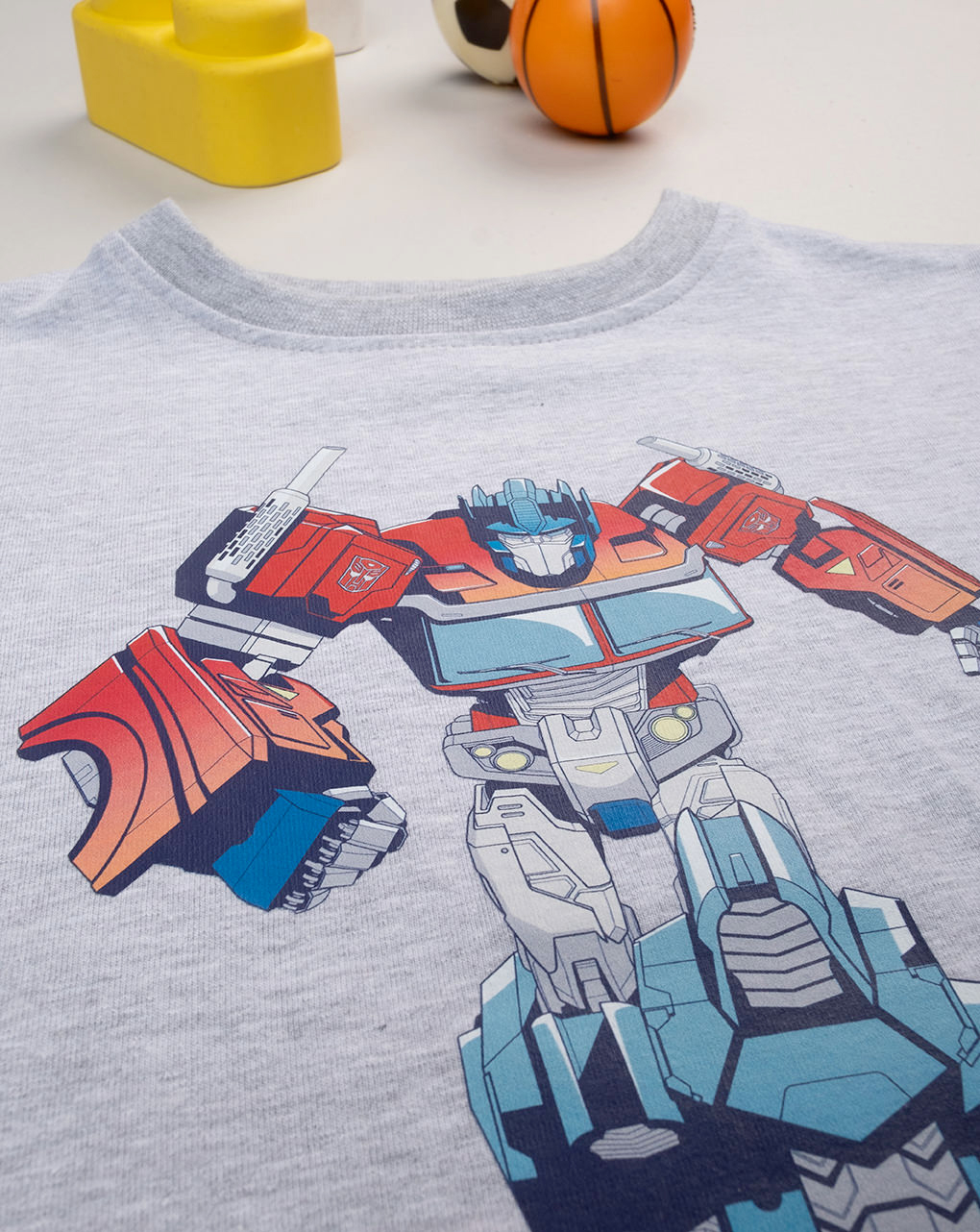 T-shirt bimbo grigia transformer