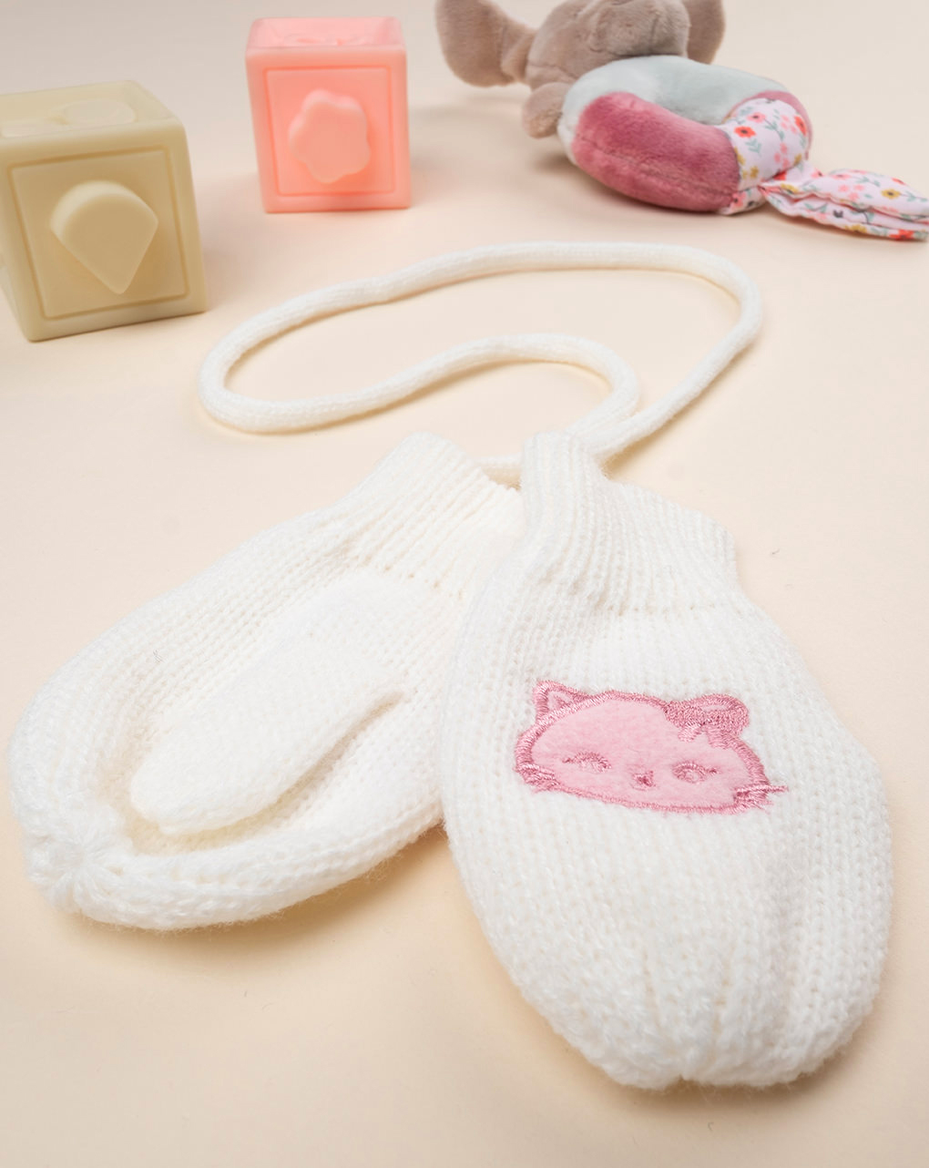 Muffole tricot bimba panna