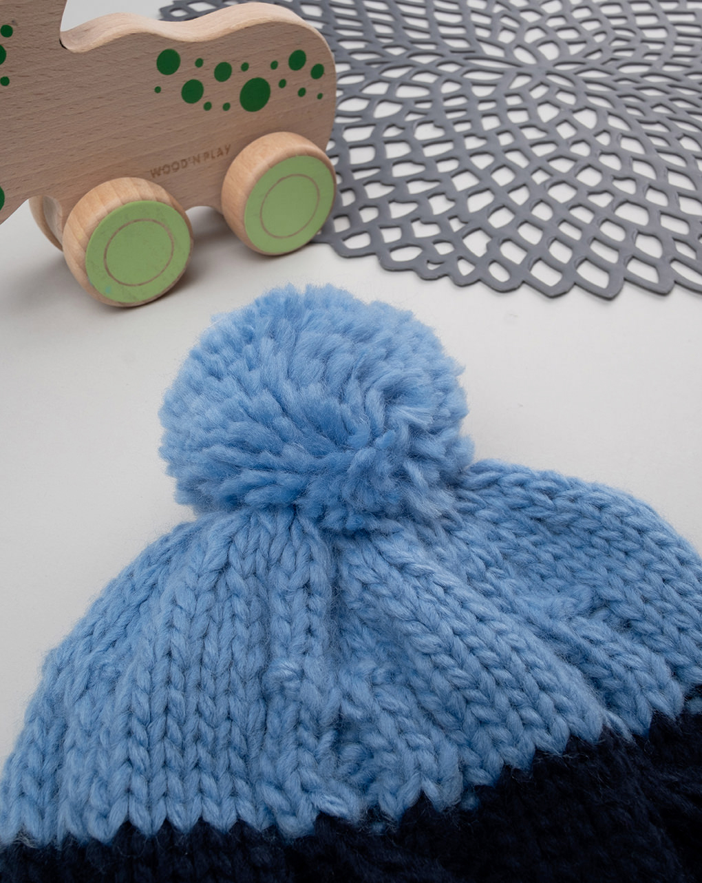 Cappello tricot bambino pom pom