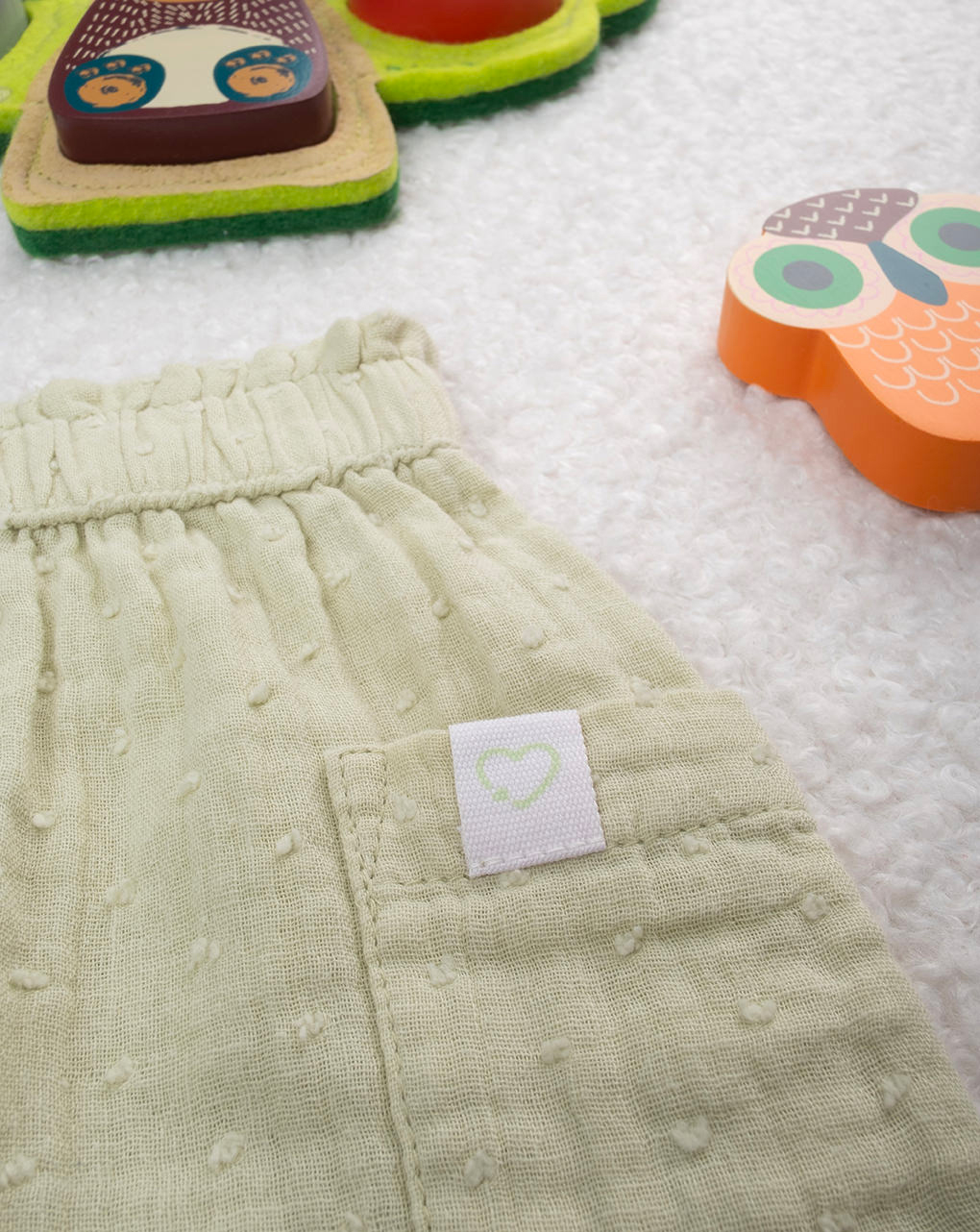 Shorts bimba verde con tasche