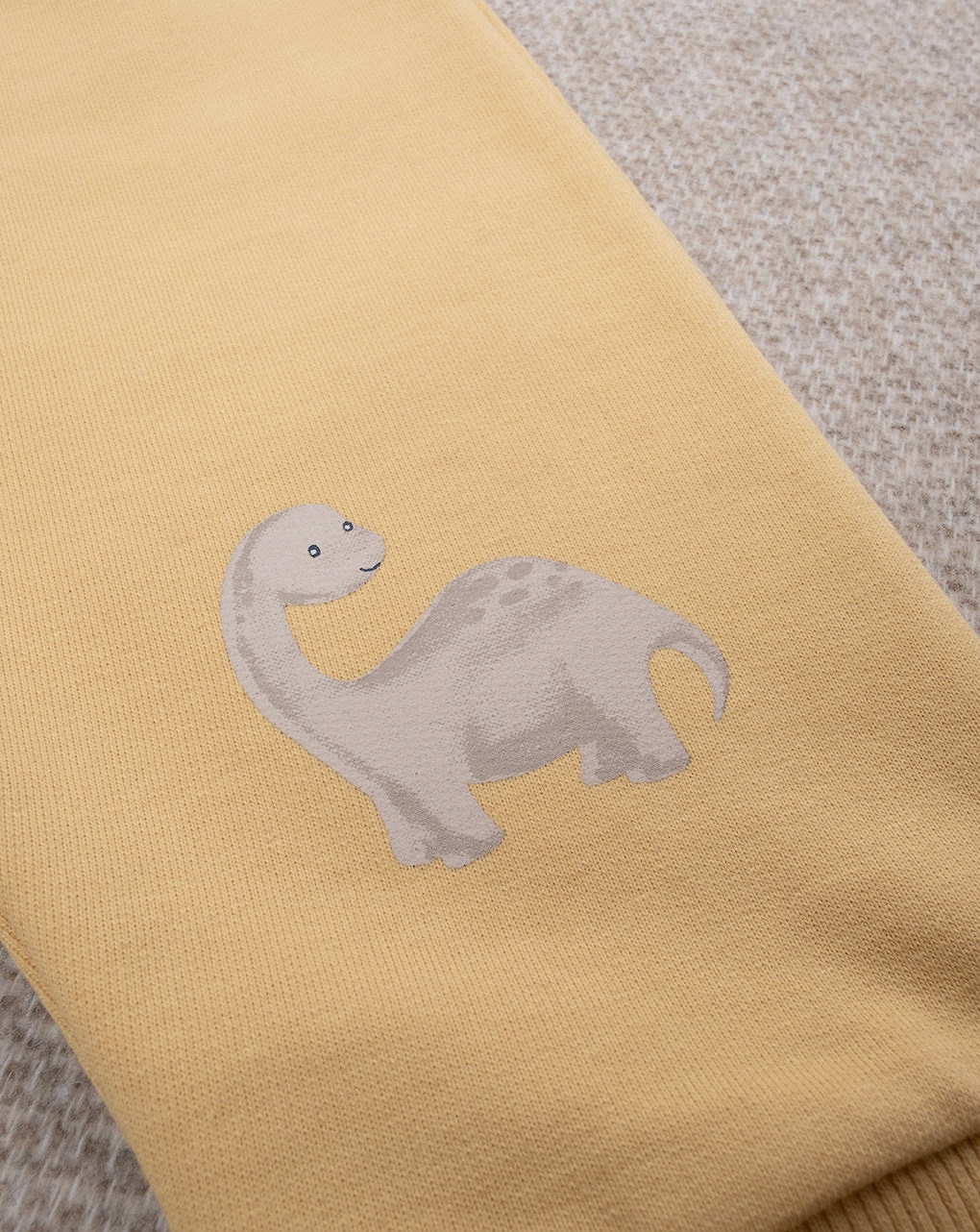 Pantalone bimbo giallo dinosauri