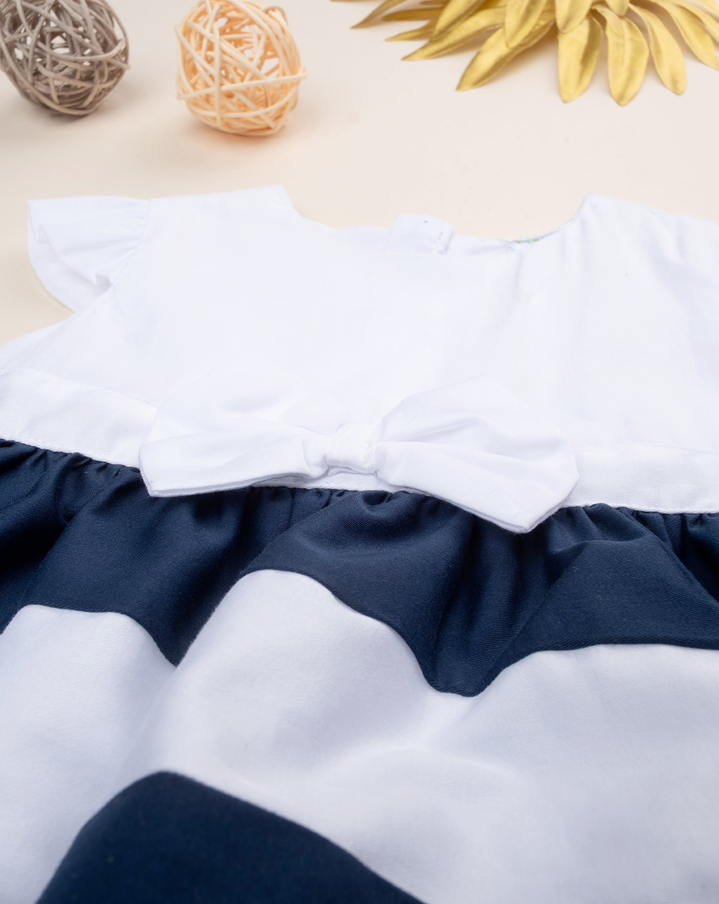 Abito rigato bianco/blu bimba con fiocco