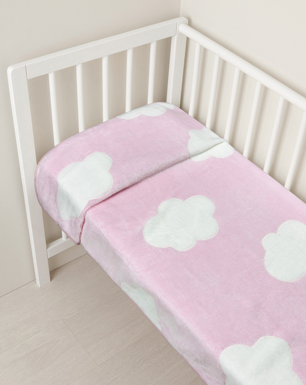 Coperta per culla in finta pelliccetta rosa con nuvole