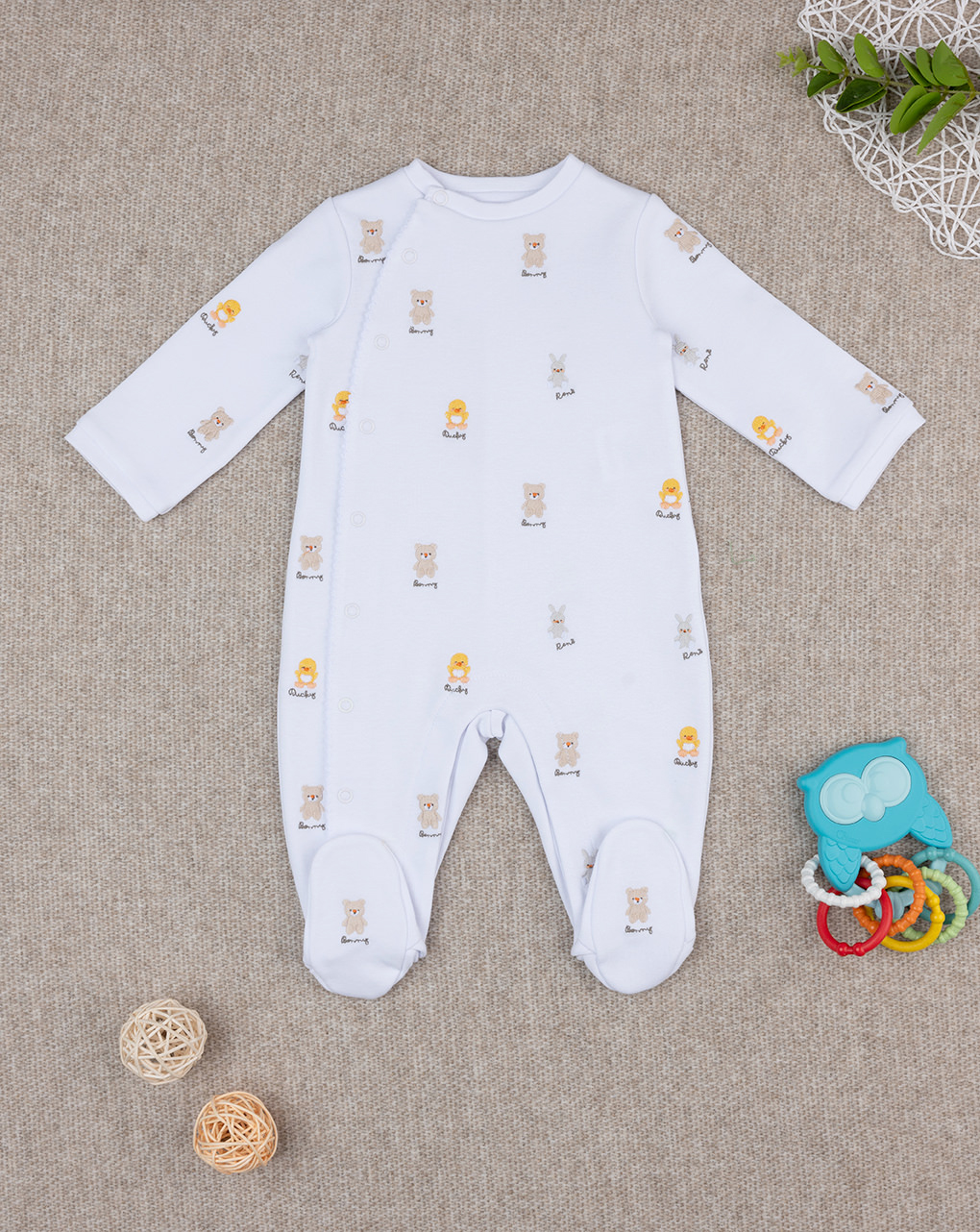 Tutina unisex smile ricami allover
