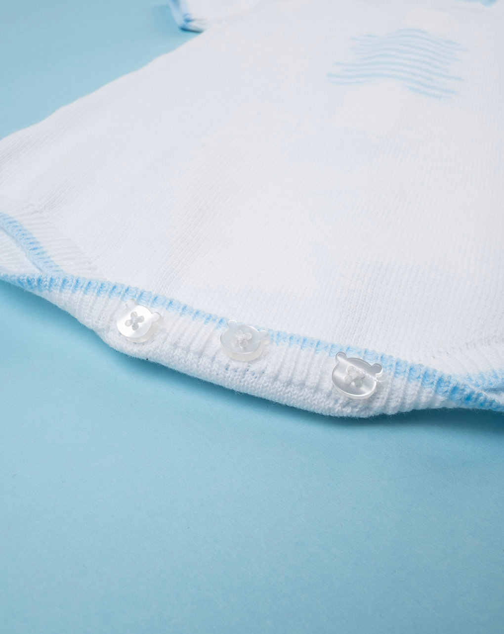 Pagliaccetto tricot bianco con orsetto