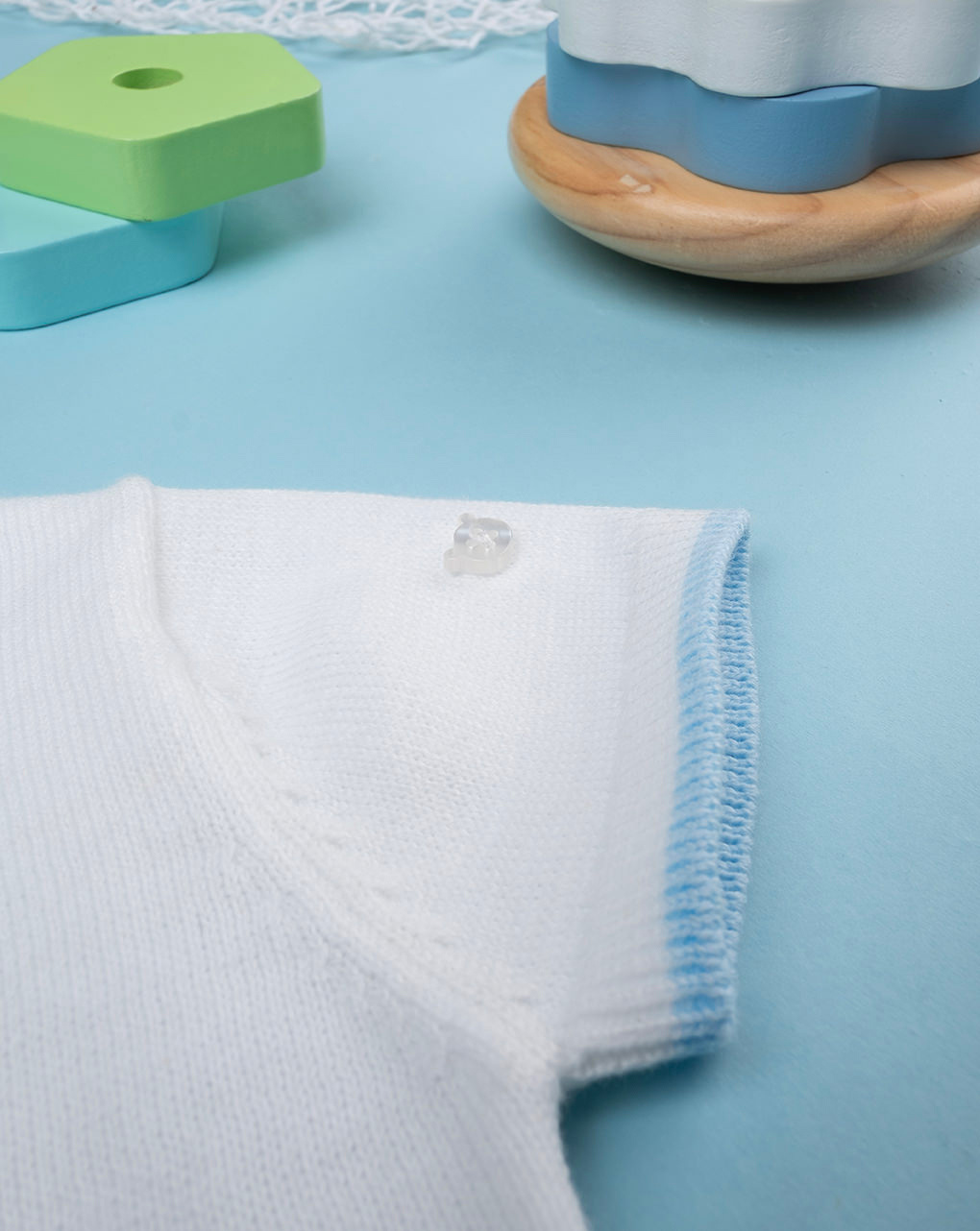 Pagliaccetto tricot bianco con orsetto