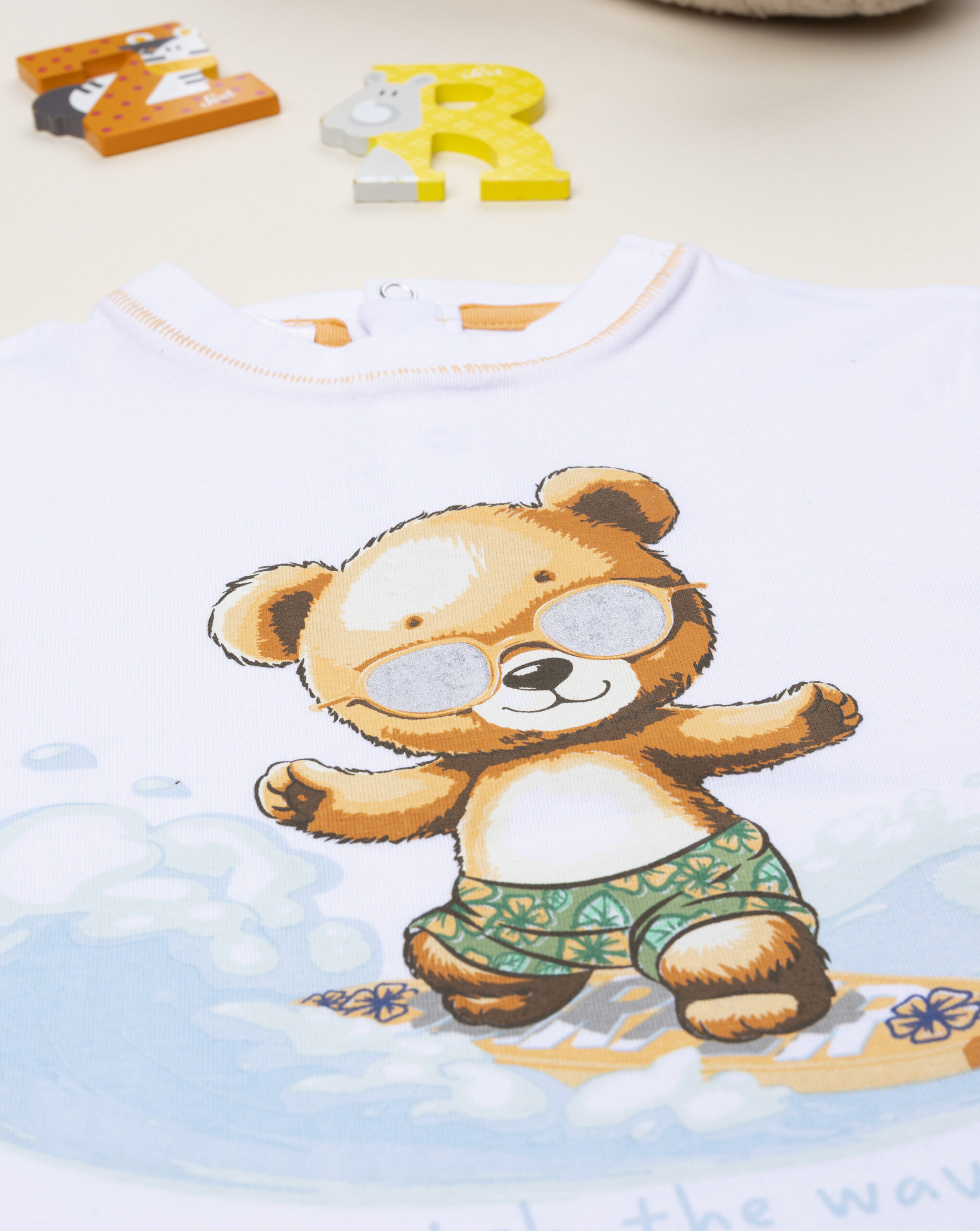 T-shirt bimbo blu orso surf