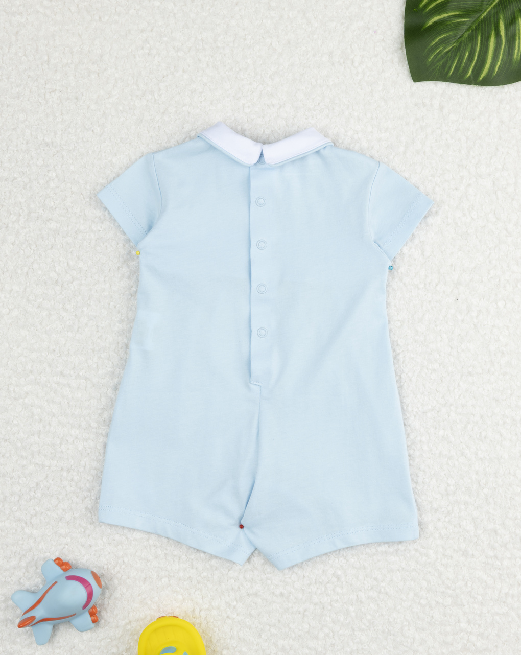 Pagliaccetto bimbo azzurro con ricami