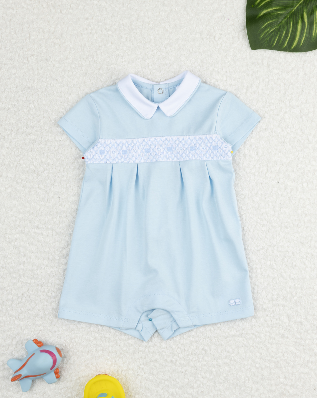 Pagliaccetto bimbo azzurro con ricami